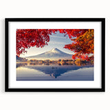 Framed wall art featuring a serene lake landscape with vibrant colors, set in a sleek black frame with a white mat, ideal for home decor and interior design.