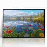 Framed wall art featuring a serene landscape with a tranquil lake, surrounded by lush greenery and a clear blue sky, perfect for home decor. The black frame adds elegance to this nature-inspired piece.