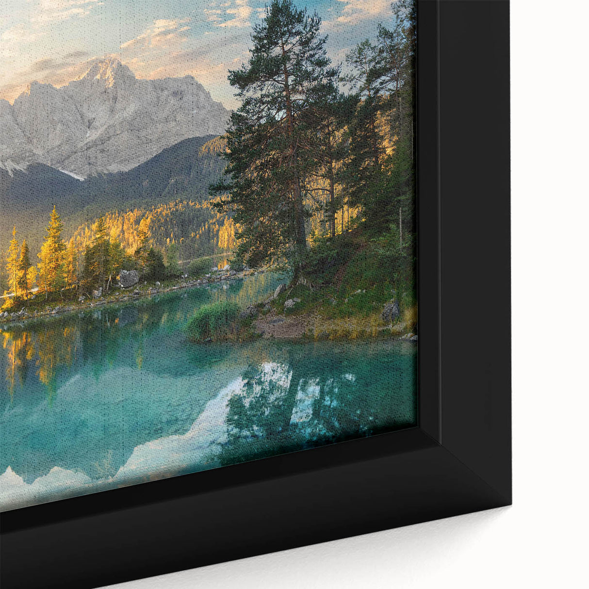 Framed canvas wall art showcasing a serene landscape of a tranquil lake surrounded by lush greenery, highlighting vibrant colors and intricate details for home decor.