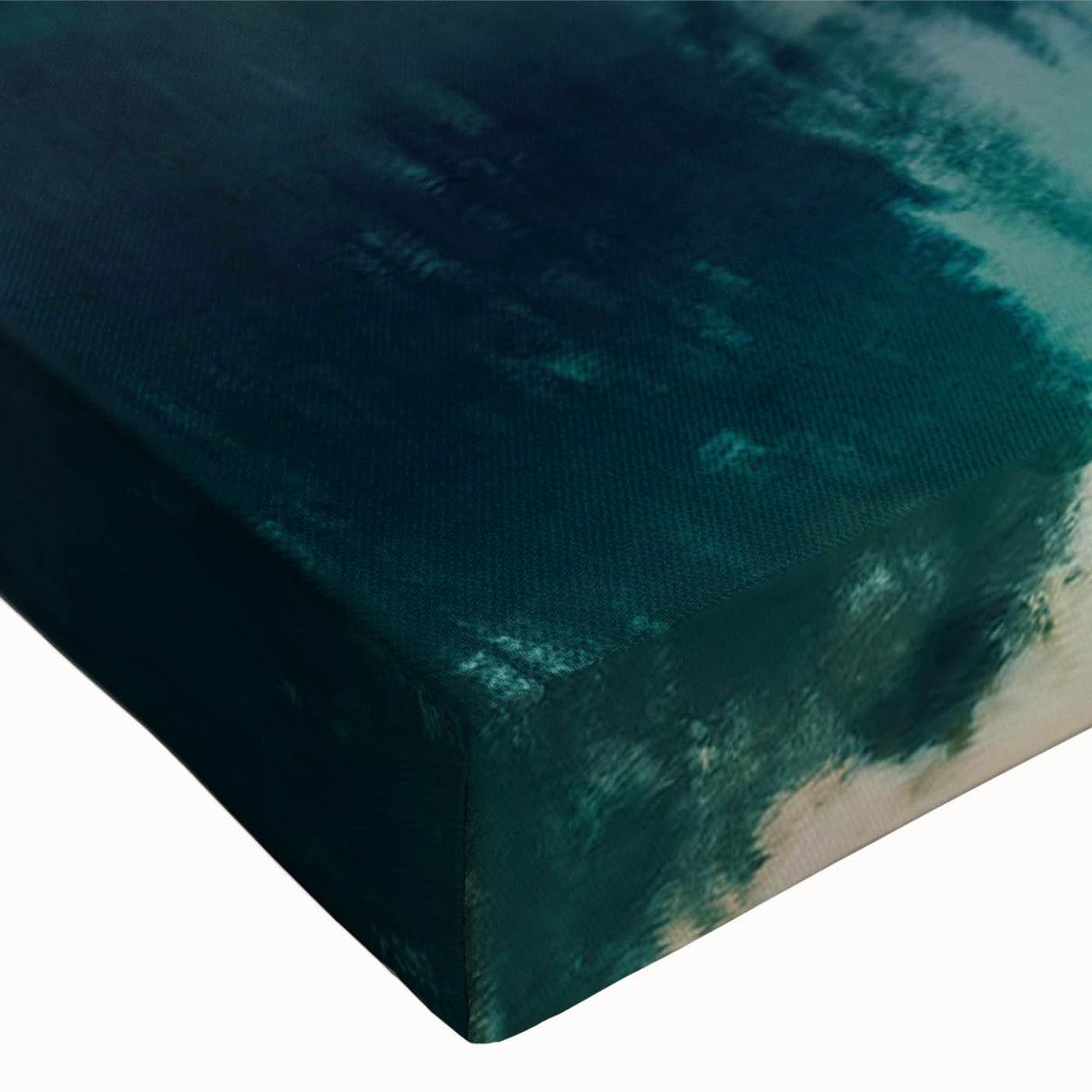 Close-up of a stretched canvas wall art piece showcasing a serene lake landscape with vivid blue waters and lush green trees, perfect for home decor.