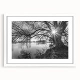 Framed wall art featuring a serene lake landscape design, elegantly displayed with a white mat. Perfect for home decor, adds tranquility and style to any space.