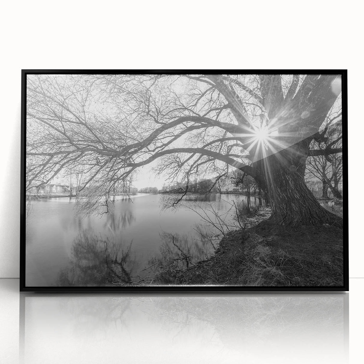 Framed acrylic wall art showcasing a serene landscape with tranquil lakes, designed in a modern style with a sleek black frame, perfect for home decor.