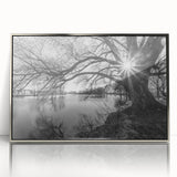 Framed wall art featuring a serene landscape with tranquil lakes, showcased in a sleek silver frame, enhancing any interior decor with its calming aesthetic.