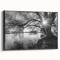 Framed canvas wall art showcasing a serene lake landscape design with vibrant colors and intricate details, presented in a sleek black frame, ideal for enhancing home decor.