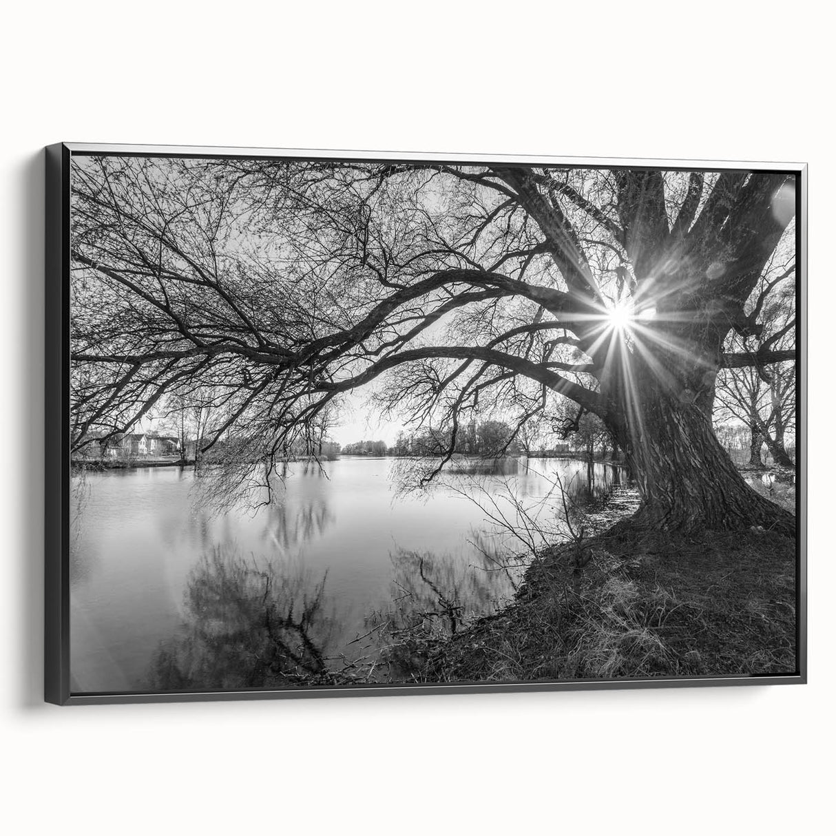 Framed canvas wall art showcasing a serene lake landscape design with vibrant colors and intricate details, presented in a sleek black frame, ideal for enhancing home decor.