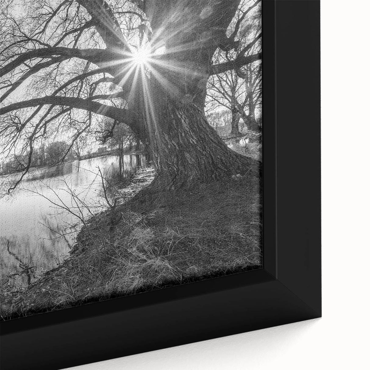 Framed canvas wall art depicting a serene lake landscape, showcasing vibrant blue waters and lush green trees, ideal for enhancing home décor with nature themes.