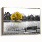 Framed canvas wall art showcasing a serene lakeside landscape design with gold accents, perfect for enhancing home decor. The artwork features tranquil blue water reflecting surrounding greenery, ideal for nature lovers.