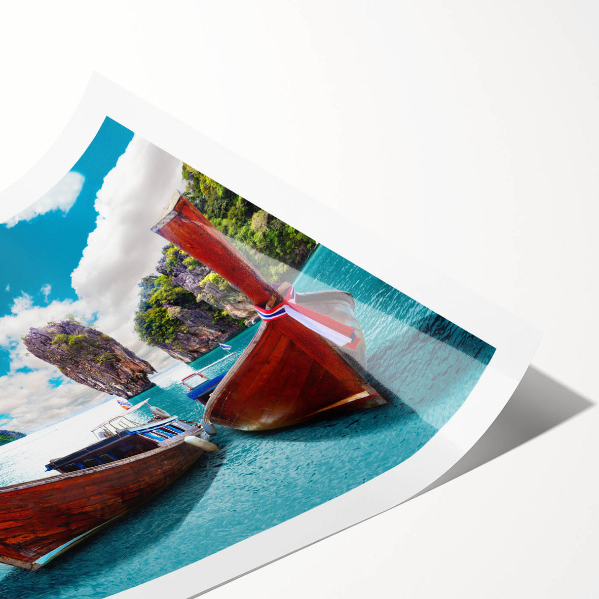 Rolled print of a serene lake landscape featuring lush greenery and a vibrant blue sky, ideal for home decor. The artwork is packaged securely in a cardboard tube for safe shipping.