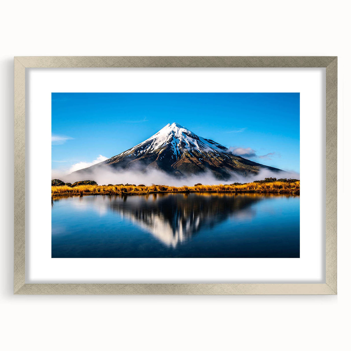 Framed wall art featuring a serene lakeside landscape design with a silver mat and frame, ideal for enhancing home décor and adding tranquility to any space.