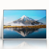 Framed acrylic wall art featuring a serene lake landscape design with vibrant colors, presented in a sleek white frame, ideal for home decor enhancement.