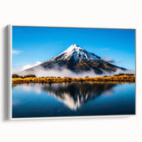 Framed canvas wall art showcasing a serene lake landscape with vibrant colors, designed to enhance home decor, viewed from the side against a white background.