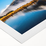 Rolled canvas art print showcasing a serene lake landscape with vibrant colors and intricate details, designed to enhance home decor aesthetics.