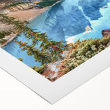 Rolled canvas showcasing a serene lake landscape with vibrant blue waters and lush green trees, ideal for enhancing home decor. Perfect for nature enthusiasts.