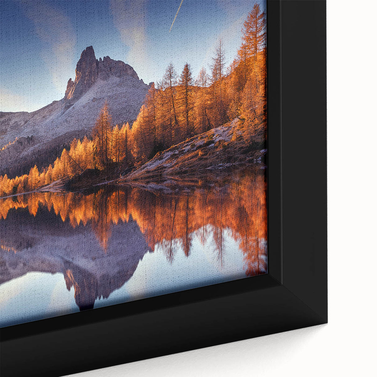 Framed canvas wall art showcasing a serene lake landscape, highlighting vibrant blues and greens with intricate details, ideal for home decor enhancement.