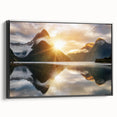 Framed canvas wall art displaying a serene lake landscape, featuring vibrant blues and greens, with a sleek black frame, ideal for home decor enhancement.