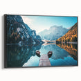 Framed canvas wall art showcasing a serene lakeside landscape with vibrant colors, presented in a sleek black frame, perfect for home decor enhancement.