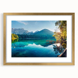 Framed wall art collection showcasing a serene lake landscape design, featuring a gold frame with a mat, perfect for enhancing home decor aesthetics.
