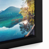 Framed canvas artwork displaying a serene landscape of tranquil lakes, featuring vibrant blues and greens that evoke a sense of calm, perfect for home decor.