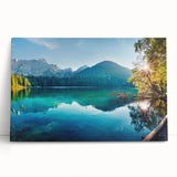 Stretched canvas wall art showcasing a serene lake landscape, featuring vibrant blues and greens with natural details, perfect for enhancing home decor aesthetics.