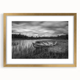 Framed wall art featuring a serene landscape of a lake, with a gold mat and frame, designed to enhance home decor. Ideal for nature lovers seeking tranquility.