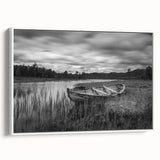 Framed canvas wall art depicting a serene lake landscape, featuring vibrant blues and greens, with a sleek white frame, ideal for modern home decor.