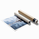 Lakeside landscape wall art print showcasing serene blue water and lush greenery, rolled for easy display, perfect for enhancing home decor.