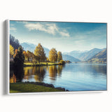 Framed canvas wall art showcasing a serene lake landscape, featuring vibrant colors and intricate details, presented in a sleek white frame for modern decor.