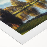 Vibrant rolled canvas wall art featuring a serene lake landscape with lush greenery and clear blue skies, ideal for enhancing home decor and creating a calming atmosphere.