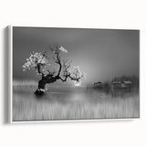 Framed canvas wall art featuring a serene lake landscape design, presented in a modern white frame, perfect for enhancing home decor and creating a calming atmosphere.