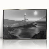 Framed acrylic wall art featuring a silver lighthouse design, showcasing vibrant colors and intricate details, perfect for coastal-themed home decor.