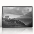 Framed wall art collection showcasing a serene lighthouse landscape design, featuring a black frame and acrylic surface, ideal for modern home decor.