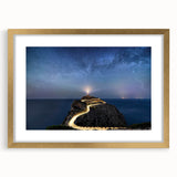 Framed wall art collection featuring a serene lighthouse landscape design with a gold mat border, ideal for adding elegance to home decor.