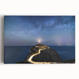 Stretched canvas wall art featuring a coastal lighthouse design against a vibrant sunset, perfect for nautical home decor. Ideal for enhancing living spaces with a serene atmosphere.