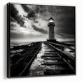 Framed canvas wall art featuring a serene lighthouse design with a scenic landscape, displayed from a side view against a black background, perfect for coastal decor.