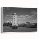 Framed canvas wall art showcasing a serene lighthouse design against a vibrant sunset, perfect for coastal-themed decor, enhancing home aesthetics.