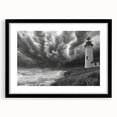 Framed wall art featuring a serene lighthouse landscape design, showcased in a sleek black frame with a mat, perfect for coastal decor enthusiasts. This elegant piece adds a calming touch to any home or office space.