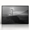Framed wall art featuring a coastal landscape with a lighthouse, set against a vibrant sunset, highlighted by black acrylic framing, perfect for home decor.