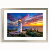 Framed silver wall art featuring a serene lighthouse design, showcasing vibrant landscapes with a mat for added depth, perfect for home decor enhancement.
