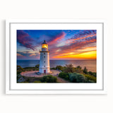 Framed wall art piece showcasing a scenic lighthouse landscape design, with a white mat and frame, perfect for coastal-themed home decor and interior styling.