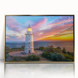 Framed wall art featuring a lighthouse design with a gold acrylic front, showcasing vibrant colors and intricate detailing, perfect for coastal-themed decor.