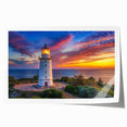 Serene coastal landscape featuring a lighthouse on a rocky shore, with vibrant sunset colors illuminating the sky. Perfect for home decor enthusiasts seeking nautical-themed wall art.