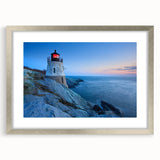 Framed wall art collection featuring a serene lighthouse landscape design, with a silver mat and frame, complementing coastal home decor aesthetics.
