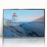 Framed acrylic wall art showcasing a serene lighthouse landscape design in silver tones, perfect for coastal-themed home decor; ideal for brightening any room.