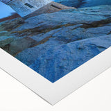 Vibrant rolled canvas artwork depicting a serene lighthouse landscape at sunset, showcasing rich colors and detailed brushwork, perfect for home decor.