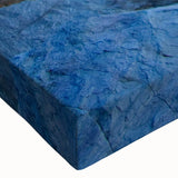 Close-up of a stretched canvas featuring a serene lighthouse landscape wall art design, showcasing vibrant colors and intricate details ideal for coastal decor.