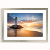 Framed wall art featuring a serene lighthouse landscape design with a silver mat, perfect for enhancing coastal-themed home decor. The artwork captures tranquil ocean waves and a bright sky, ideal for adding a calming touch to living spaces.