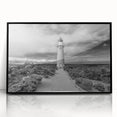 Framed acrylic wall art collection showcasing a scenic lighthouse design, with a sleek black frame and clear front view, perfect for coastal-themed decor.