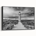 Framed canvas wall art collection featuring a serene landscape with a lighthouse, showcasing vibrant colors and intricate details, perfect for enhancing home decor.