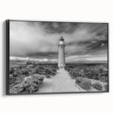 Framed canvas wall art collection featuring a serene landscape with a lighthouse, showcasing vibrant colors and intricate details, perfect for enhancing home decor.