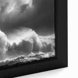Close-up of a framed canvas wall art piece showcasing a picturesque lighthouse design set against a vibrant sunset, perfect for coastal-themed decor.